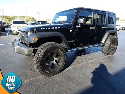 Used 2011 Jeep Wrangler Unlimited Rubicon w/ Dual Top Group
