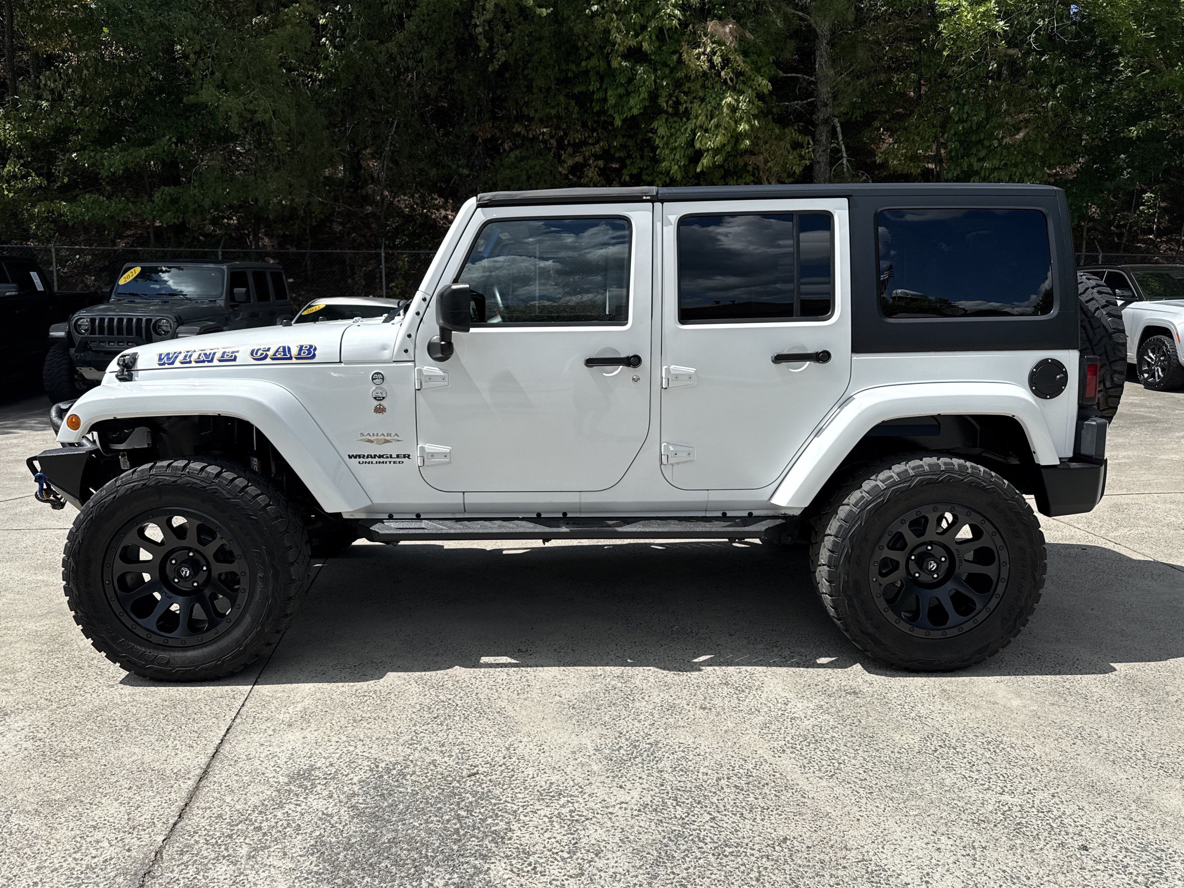 Used 2013 Jeep Wrangler Unlimited Sahara w/ Dual Top Group AWD/4WD image 4