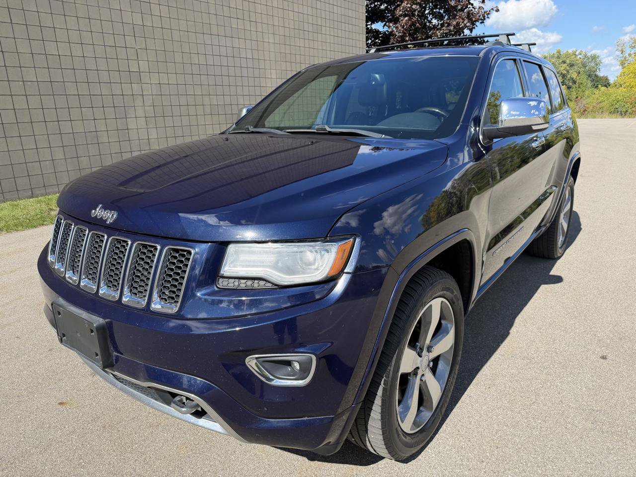 Used 2014 Jeep Grand Cherokee Overland w/ Advanced Technology Group AWD/4WD image 1