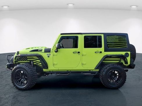 Used 2016 Jeep Wrangler Unlimited Sahara w/ Dual Top Group AWD/4WD image 11