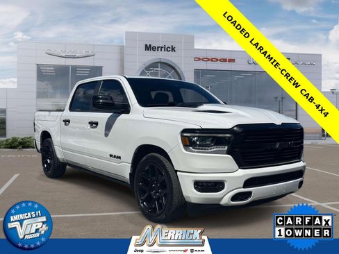 Used 2024 RAM 1500 Laramie AWD/4WD image 1