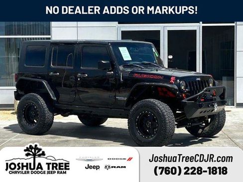 Used 2009 Jeep Wrangler Unlimited Rubicon w/ Dual Top Group AWD/4WD image 1