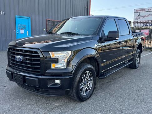 Used 2015 Ford F150 XLT AWD/4WD image 1