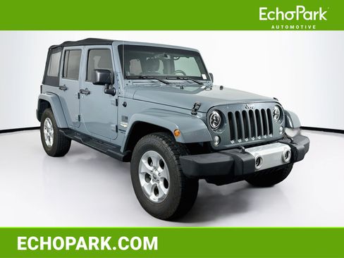 Used 2014 Jeep Wrangler Unlimited Sahara w/ Connectivity Group AWD/4WD image 1