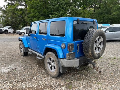 Used 2014 Jeep Wrangler Unlimited Sahara AWD/4WD image 2