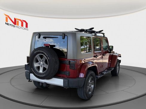 Used 2010 Jeep Wrangler Unlimited Sahara w/ Dual Top Group AWD/4WD image 5