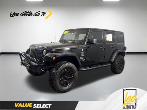 Used 2015 Jeep Wrangler Unlimited Sahara AWD/4WD image 1