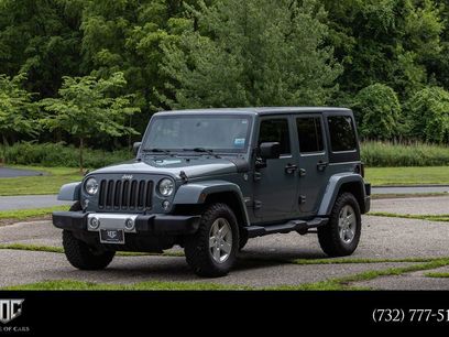 Used 2015 Jeep Wrangler Unlimited Sahara w/ Dual Top Group
