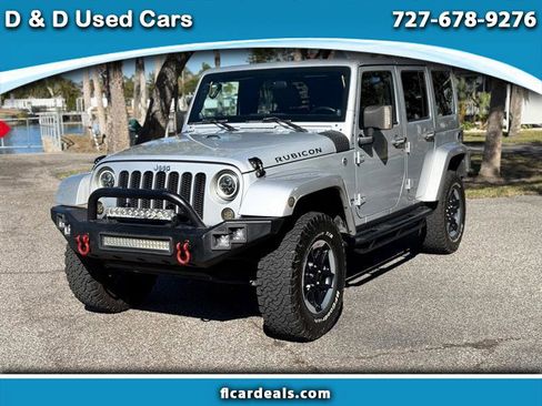 Used 2012 Jeep Wrangler Unlimited Rubicon w/ Dual Top Group image 1