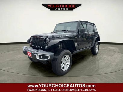 Used 2015 Jeep Wrangler Unlimited Rubicon w/ Dual Top Group