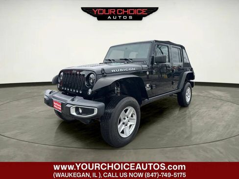 Used 2015 Jeep Wrangler Unlimited Rubicon w/ Dual Top Group AWD/4WD image 1