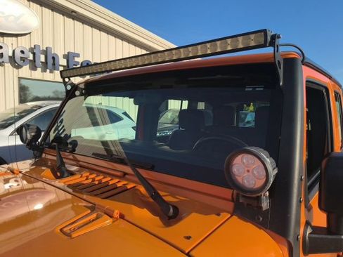 Used 2012 Jeep Wrangler Unlimited Sport w/ Black Appearance Group AWD/4WD image 11
