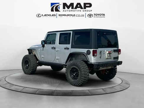 Used 2010 Jeep Wrangler Unlimited Rubicon w/ Dual Top Group image 3