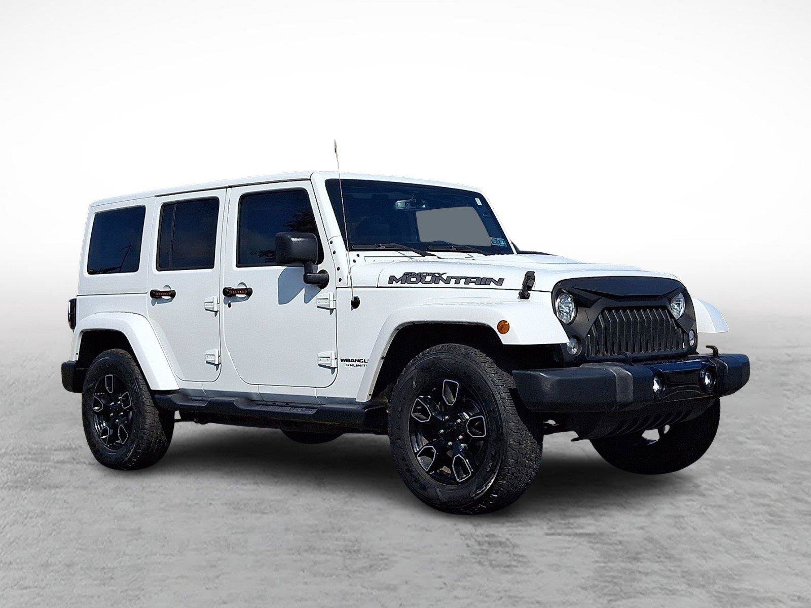 Used 2017 Jeep Wrangler Unlimited Sahara AWD/4WD image 1