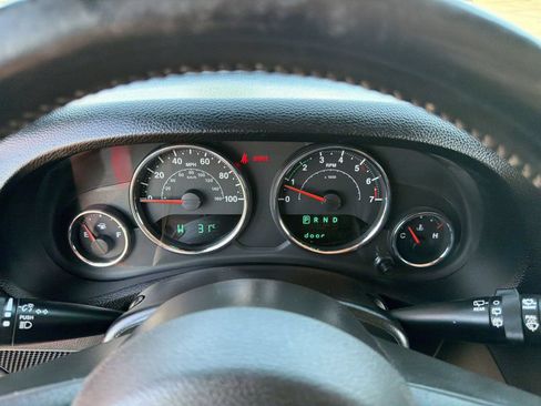 Used 2012 Jeep Wrangler Unlimited Sport AWD/4WD image 17