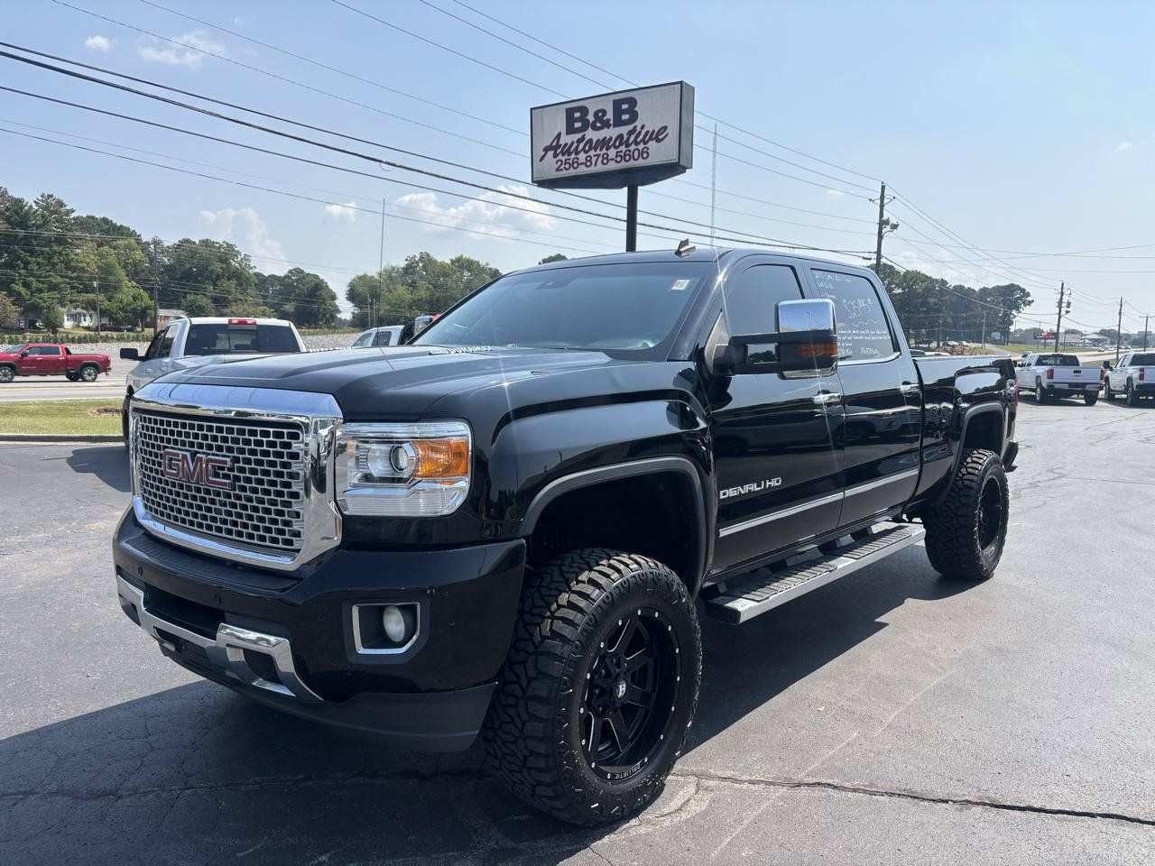 Used 2015 GMC Sierra 2500 Denali w/ Duramax Plus Package AWD/4WD image 1