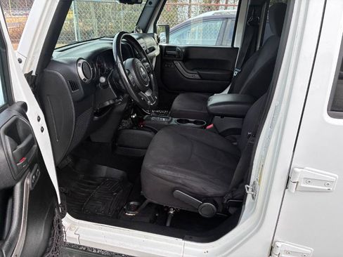 Used 2013 Jeep Wrangler Unlimited Sport AWD/4WD image 9