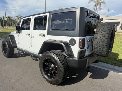 Used 2014 Jeep Wrangler Unlimited Rubicon w/ Dual Top Group AWD/4WD image 6