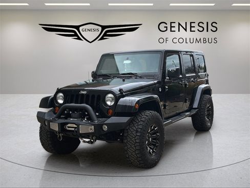 Used 2012 Jeep Wrangler Unlimited Sahara w/ Dual Top Group image 1