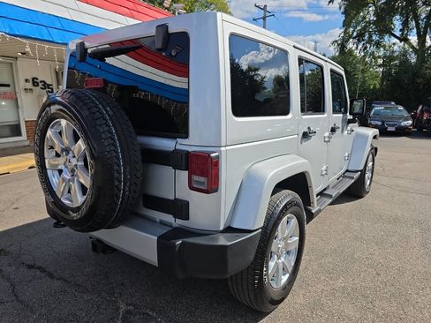 Used 2012 Jeep Wrangler Unlimited Sahara w/ Dual Top Group image 19