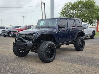 Used 2013 Jeep Wrangler Unlimited Sport AWD/4WD video 1