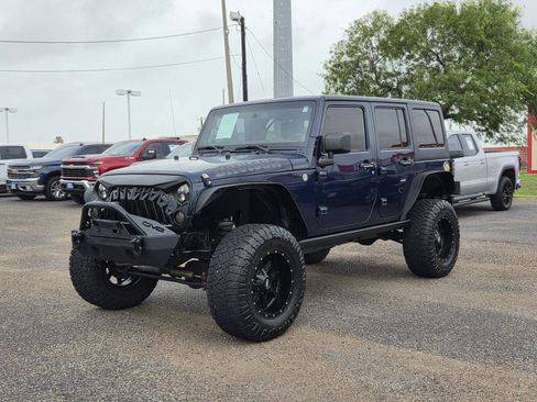Used 2013 Jeep Wrangler Unlimited Sport AWD/4WD image 1