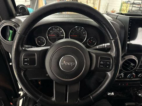Used 2012 Jeep Wrangler Unlimited Sport AWD/4WD image 10