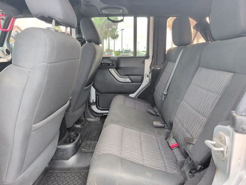 Used 2012 Jeep Wrangler Unlimited Rubicon w/ Dual Top Group AWD/4WD image 21