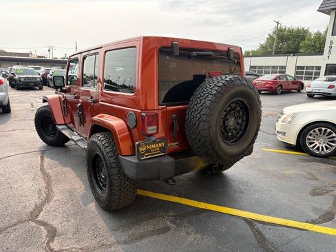 Used 2014 Jeep Wrangler Unlimited Sahara w/ Dual Top Group AWD/4WD image 48