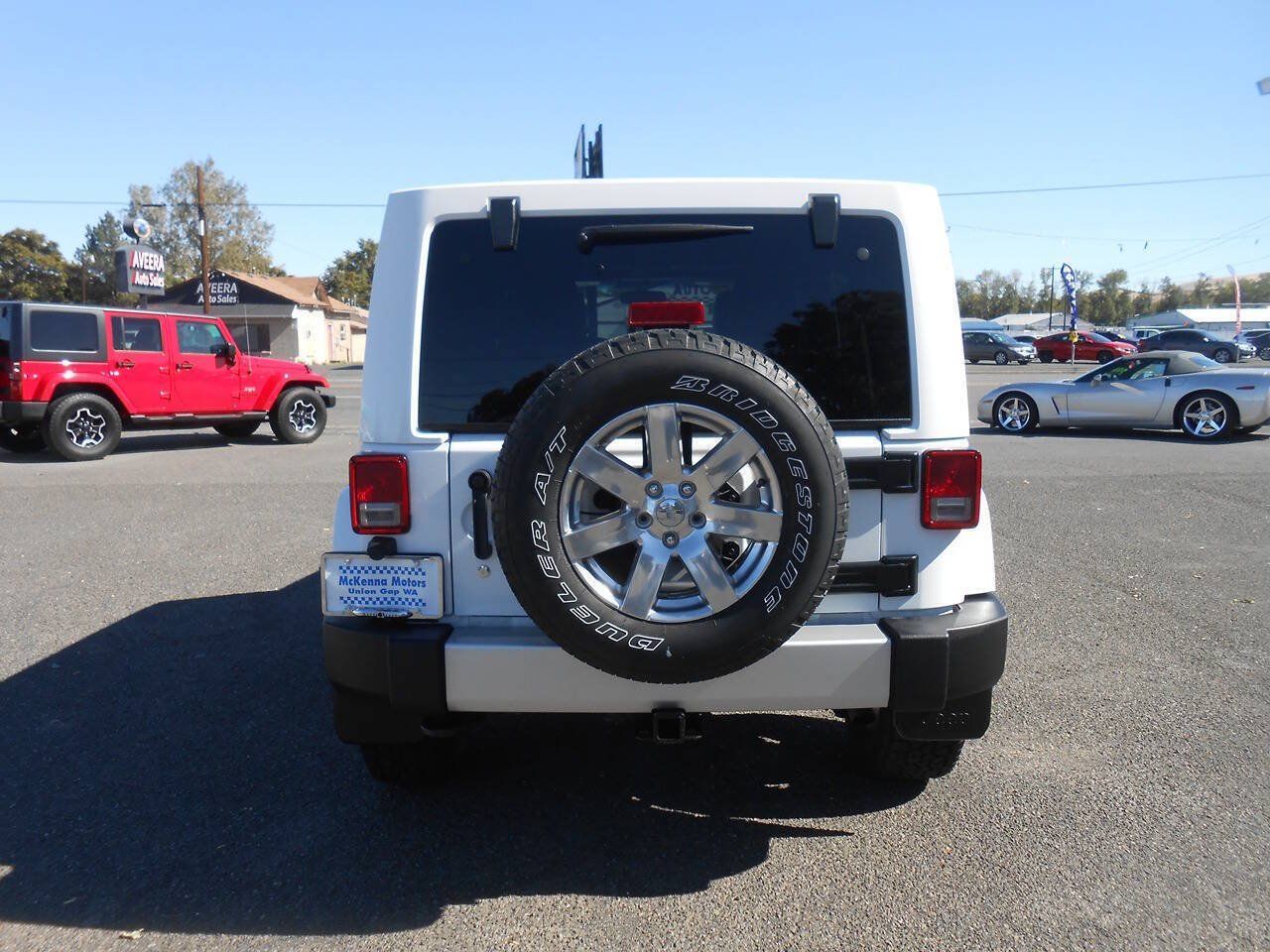 Used 2012 Jeep Wrangler Unlimited Sahara w/ Dual Top Group AWD/4WD image 8