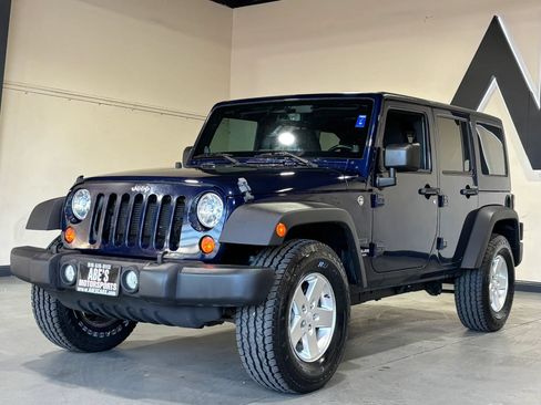 Used 2013 Jeep Wrangler Unlimited Sport AWD/4WD image 1