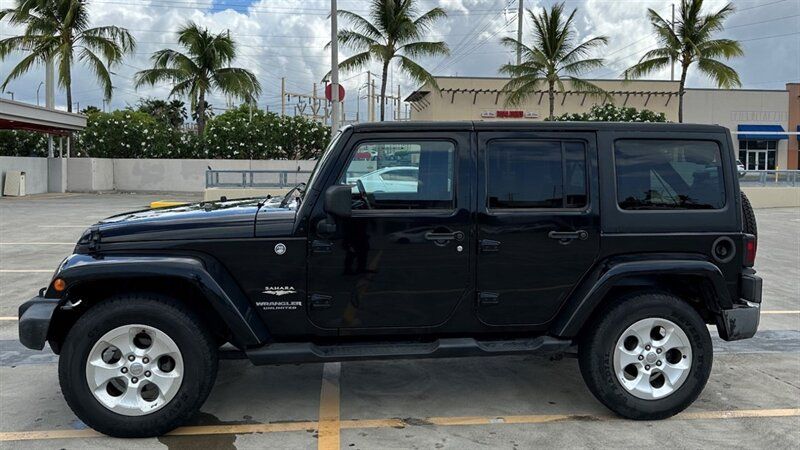 Used 2013 Jeep Wrangler Unlimited Sahara AWD/4WD image 2
