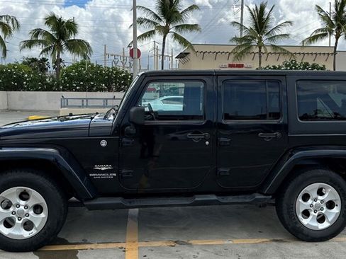 Used 2013 Jeep Wrangler Unlimited Sahara AWD/4WD image 2