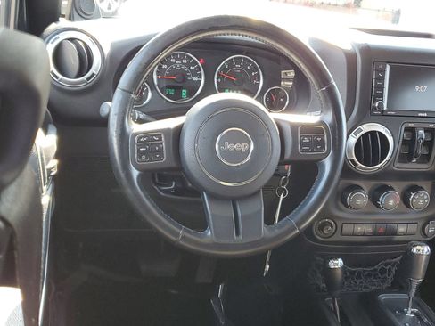 Used 2012 Jeep Wrangler Unlimited Sahara w/ Dual Top Group AWD/4WD image 10