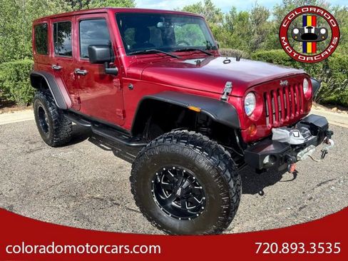 Used 2013 Jeep Wrangler Unlimited Sahara w/ Dual Top Group AWD/4WD image 1