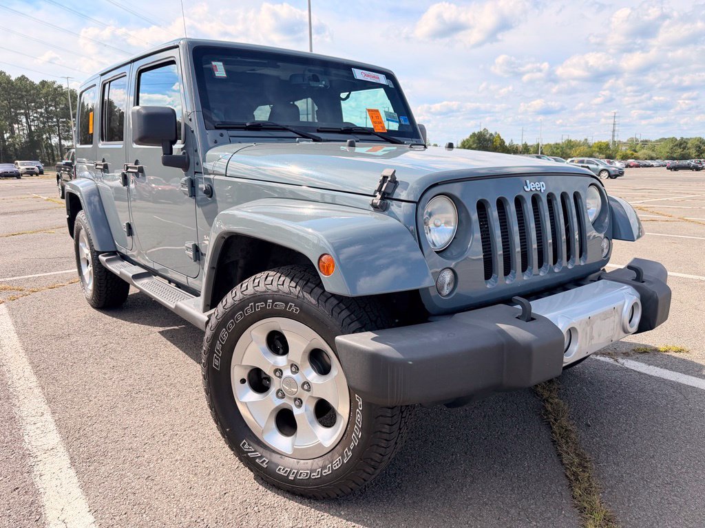 Used 2014 Jeep Wrangler Unlimited Sahara w/ Dual Top Group AWD/4WD image 1