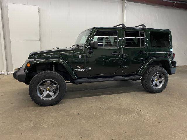 Used 2011 Jeep Wrangler Unlimited Sahara AWD/4WD image 1