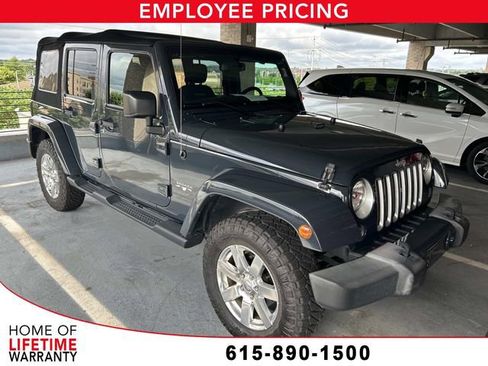 Used 2016 Jeep Wrangler Unlimited Sahara AWD/4WD image 1