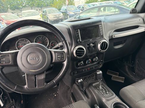 Used 2012 Jeep Wrangler Sahara w/ Dual Top Group AWD/4WD image 11