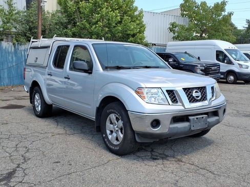 Used 2010 Nissan Frontier SE AWD/4WD image 1
