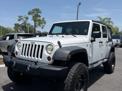 Used 2012 Jeep Wrangler Unlimited Sport AWD/4WD image 1