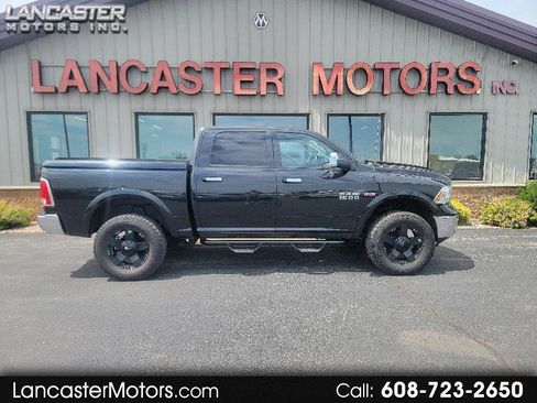 Used 2015 RAM 1500 Laramie AWD/4WD image 1