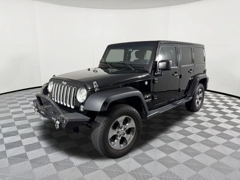 Used 2017 Jeep Wrangler Unlimited Sahara AWD/4WD image 1