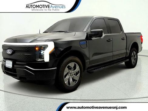 Used 2024 Ford F150 Lightning XLT AWD/4WD image 1