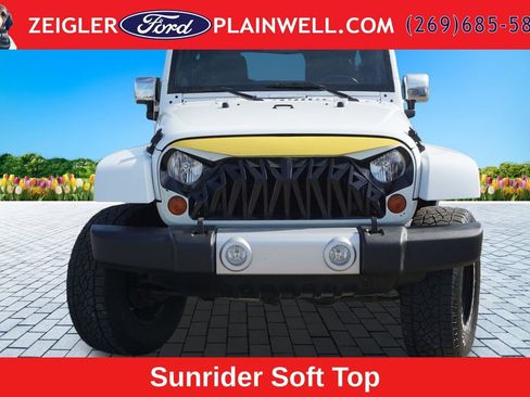 Used 2012 Jeep Wrangler Unlimited Sahara w/ Dual Top Group AWD/4WD image 8