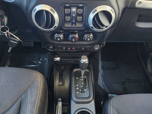 Used 2013 Jeep Wrangler Unlimited Sahara w/ Dual Top Group AWD/4WD image 13