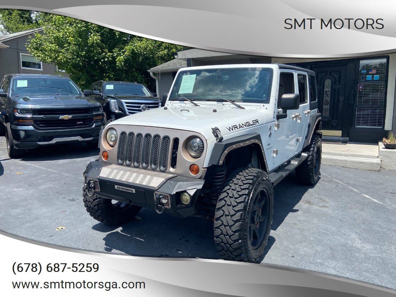 Used 2013 Jeep Wrangler Unlimited Sahara AWD/4WD image 1