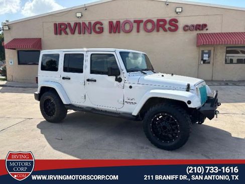 Used 2016 Jeep Wrangler Unlimited Sahara w/ Connectivity Group AWD/4WD image 1