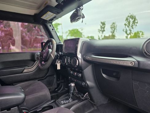 Used 2013 Jeep Wrangler Unlimited Sport AWD/4WD image 23