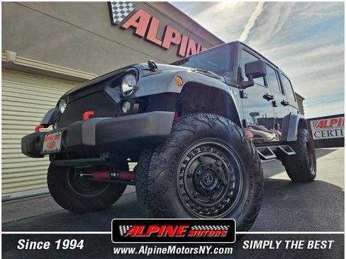 Used 2014 Jeep Wrangler Unlimited Sahara w/ Dual Top Group image 1